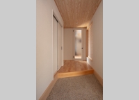 玄関からエル字に広く伸びる土間は洗い出し仕上げ
ベンチも設置、左側はおおきな土間収納、右手は和室に直接入れるようになっています